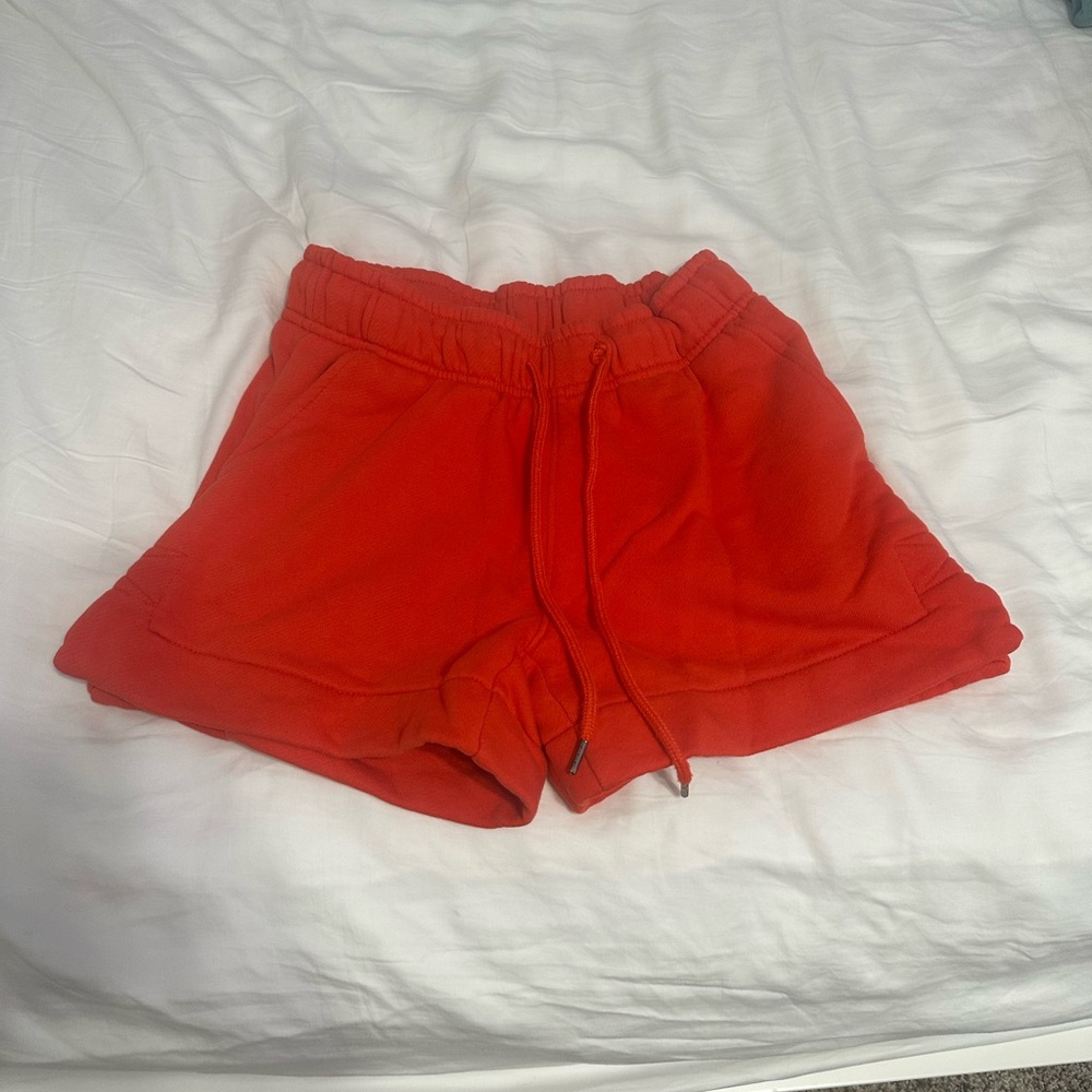 Orange-ish red sweat shorts
